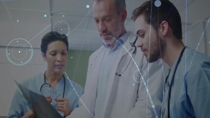 Reviewing documents, medical professionals with data processing animation overlay in hospital - Powered by Adobe