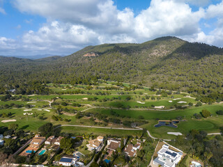 Aerial view, Spain, Balearic Islands, Mallorca, Capdepera, Cuevas de Arta and Platja de Canyamel with golf course, sand bunker, green, golfer