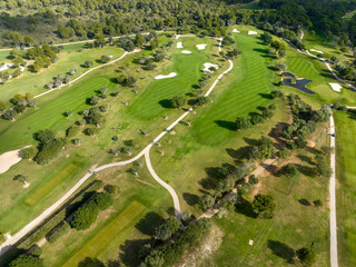 Aerial view, Spain, Balearic Islands, Mallorca, Capdepera, Cuevas de Arta and Platja de Canyamel with golf course, sand bunker, green, golfer