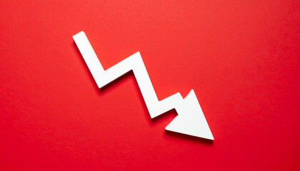 Minimalist white wooden downward arrow on red backdrop. Business decline, economic warning