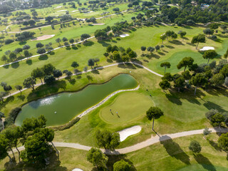 Aerial view, Spain, Balearic Islands, Mallorca, Capdepera, Cuevas de Arta and Platja de Canyamel with golf course, sand bunker, green, golfer