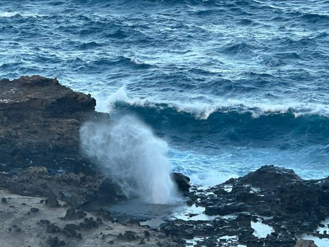 Turquoise Ocean Waves Splashing on Hawaiian Lava Coast