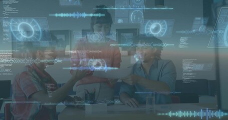 A group of diverse business people are seen discussing work during a meeting at their office - Powered by Adobe