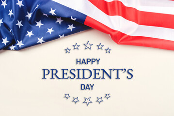 Fototapeta premium President's day. Beige background with American flag. Website banner and greeting card design template.