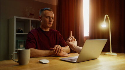 Man see middle finger remote, obscene hand fuck you off gesture from laptop screen. Person visit...