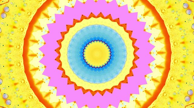 Quickly shifting patterns of brights colors and shapes, kaleidoscope style with liquid ink root elements.