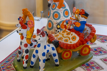 The Dymkovsky toy is a Russian folk craft that consists in making clay toys. Handmade clay...