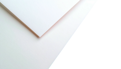 Minimalist composition of white angled planes contrasting with a black geometric shape