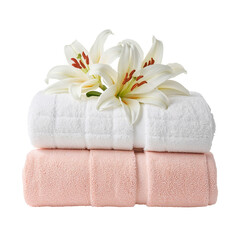 Soft Towels Stacked With White Lilies on Top in a Simple Setting at Home