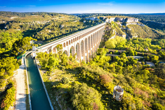 Ancient Roquefavour stone Aqueduct in green landscape aerial  view