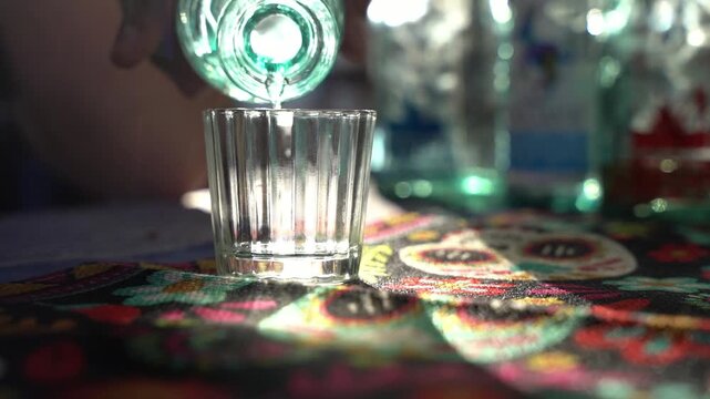 Mezcal pour in slow motion