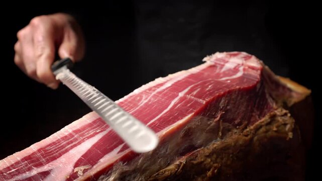 Professional Hands Slicing Iberian Ham from Side Angle, Slow Motion 4K
