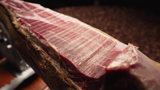 Top View Pan of Iberian Ham Leg with Marbled Meat, Slow Motion 4K