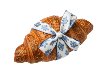 Golden croissant with blue snowflake ribbon bow decoration, isolated on a transparent background