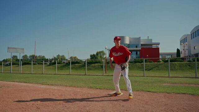 The catcher catches the ball while the batter runs to base. The baseball players train by playing.