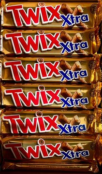  Twix chocolate bars on a store shelf.