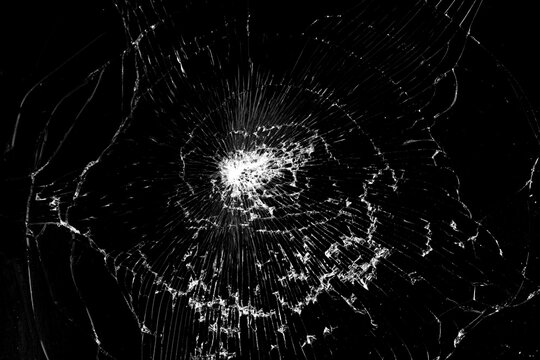 Black cracked Touch Screen Phone display background. Texture for your project. Broken black glass abstract background.