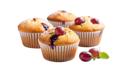 Four golden muffins, each in a paper cup, with fresh grapes atop or beside. Light dusting of sugar visible. Background completely dark