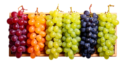 Assorted fresh grapes in a wooden crate, showcasing a vibrant array of colors, from deep reds to light greens, isolated on black