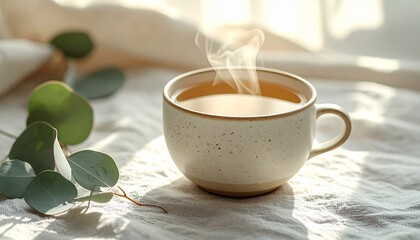 Ceramic teacup on a table covered with linen