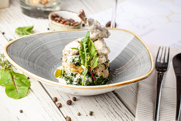 Creamy rabbit leg with cauliflower gourmet dish