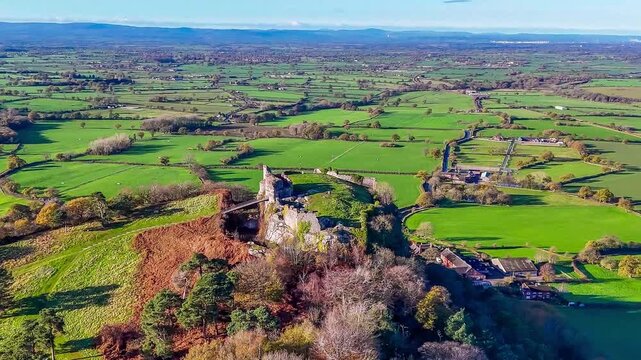 A rotating aerial view of Beeston castle  and surrounding countryside Chirk, Wales