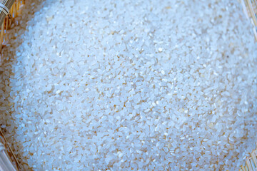 Rice grains in a wooden basket. Healthy natural food grown in Korea