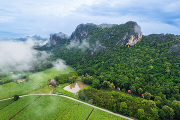 Naklejka premium Beautiful buddhist temple on high mountain in Nong Bua Lamphu province Thailand, Erawan Cave Temple.
