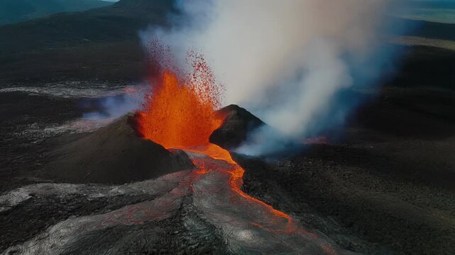 Volcan de fuego erupting lava, smoke and rocks in Guatemala by drone. Dangerous volcano, 
