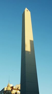 Obelisk Iconic tall monument of Buenos Aires City Argentina skyline with birds and heritage buildings, downtown