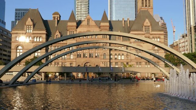 The old city hall and the fountain at Nathan Phillips Square in Toronto, Canada.