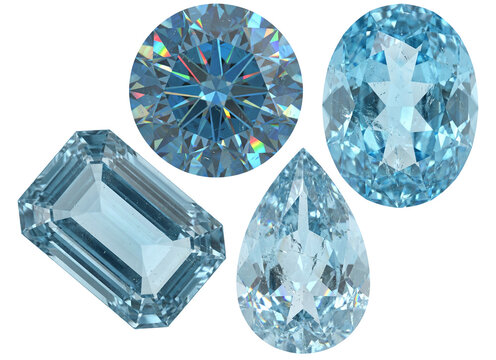 Blue aquamarine gemstones in various cuts isolated