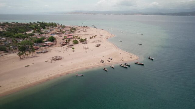 Aerial view of Playa Punta Arenas, serene beachside with boats in Araya