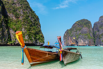 Maya Bay island Phi Phi Leh with longtail boat, turquoise clear water in Krabi Thailand