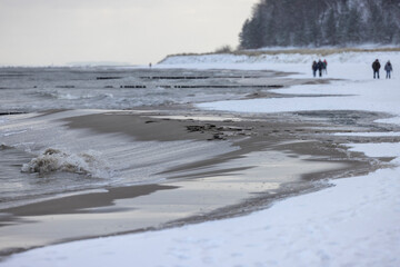 Winter walkers on the Baltic Sea coast of Usedom 