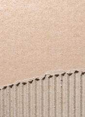 Corrugated cardboard background, brown textured paper backdrop, close-up texture details with copy space for text