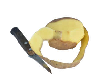 Half peeled potato and knife isolated on white background.