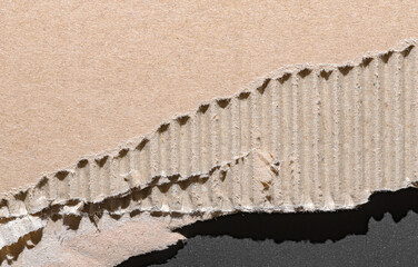 Corrugated cardboard background, brown textured paper backdrop, close-up texture details with copy space for text