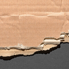 Corrugated cardboard background, brown textured paper backdrop, close-up texture details with copy space for text