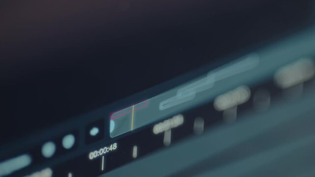 Video editing interface with a timeline and level meters