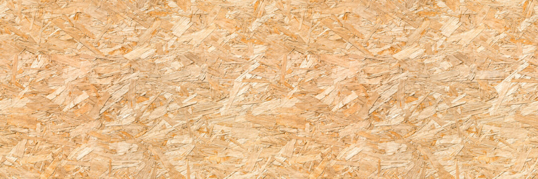 OSB Oriented strand board wood house seamless background texture &ndash; pattern of flat fibreboard building panel from wooden chip material used in construction of floor, roof and walls.