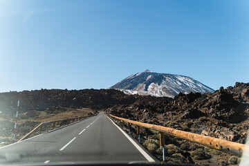 Volcanic landscape of Teide National Park, Tenerife, Spain. View on snowcapped Mount Teide.