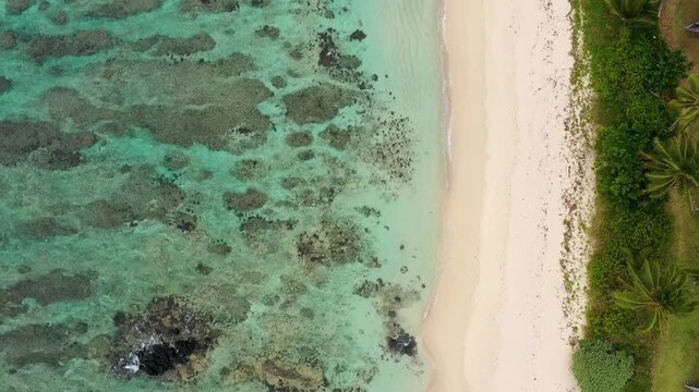 Palmar beach on the east coast, Indian Ocean, Mauritius Island. Palmar beach with turquoise sea and beautiful white sandy beach, Mauritius Island.