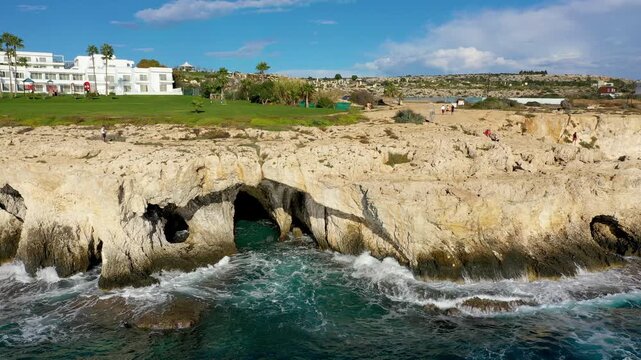 Beautiful bridge of lovers natural rock arch near of Ayia Napa, Cavo Greco and Protaras on Cyprus island, Mediterranean Sea. Legendary bridge lovers. Amazing blue green sea and sunny day