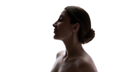 Low key female profile portrait with natural skin and soft shadows. Concept of inner balance, emotional calm, self acceptance and personal identity in modern visual culture. © master1305