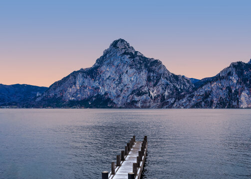 Winter Sunrise at Traunsee with Pier and Traunstein Mountain