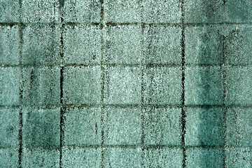Textured Green Concrete Wall with Subtle Pattern and Grime