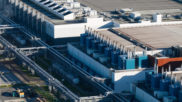 Industrial complex producing chemicals or semiconductors, aerial view