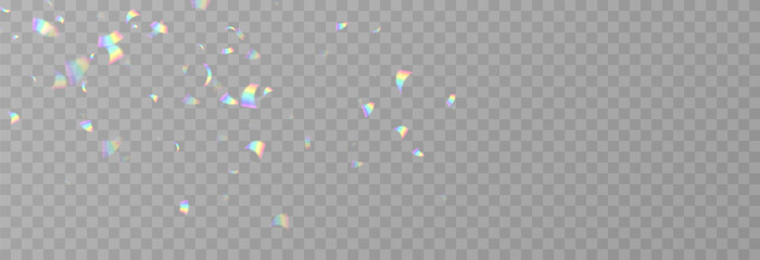 Fototapeta na wymiar Falling holographic confetti. Shiny rainbow confetti PNG. Falling streamers or tinsel on an isolated transparent background.