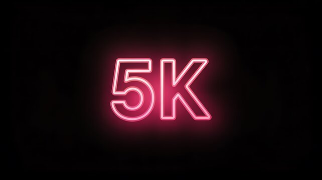 Neon glowing 5k text sign on dark background
